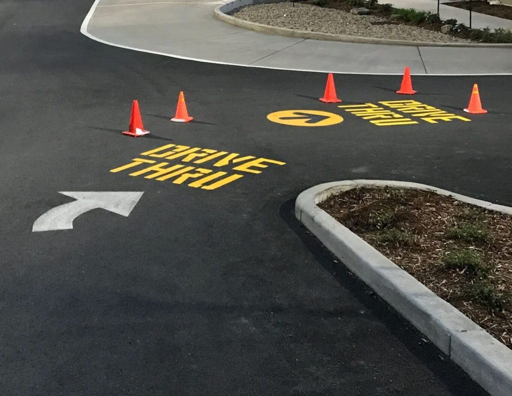 Striping a Drive-Thru? Don’t Forget These 5 Must-Have Pavement Markings